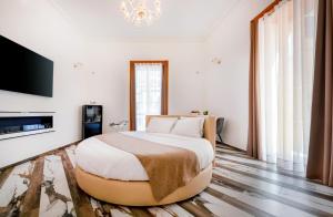 Postel nebo postele na pokoji v ubytování Sant'Antonino Luxury Suite