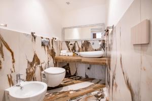 Koupelna v ubytování Sant'Antonino Luxury Suite