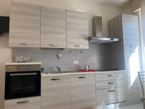 Kuchyň nebo kuchyňský kout v ubytování Appartamento in Villetta + 13 fotografií