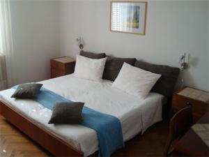 Postel nebo postele na pokoji v ubytování Rooms Rita