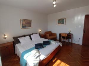 Postel nebo postele na pokoji v ubytování Rooms Rita