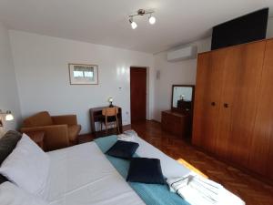 Postel nebo postele na pokoji v ubytování Rooms Rita