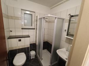 Koupelna v ubytování Rooms Rita