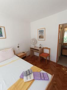 Postel nebo postele na pokoji v ubytování Rooms Rita