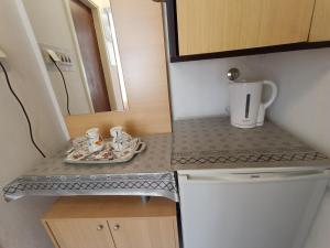 Kuchyň nebo kuchyňský kout v ubytování Rooms Rita