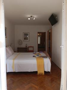 Postel nebo postele na pokoji v ubytování Rooms Rita