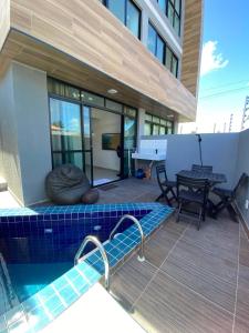 Bazén v ubytování AP TÉRREO COM PISCINA PRIVATIVA nebo v jeho okolí