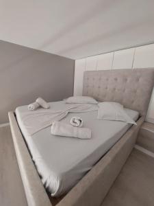 Postel nebo postele na pokoji v ubytování Velmar Hotel