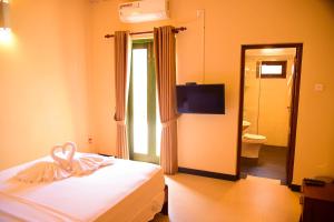 Ένα ή περισσότερα κρεβάτια σε δωμάτιο στο Villa Olinia +20 φωτογραφίες