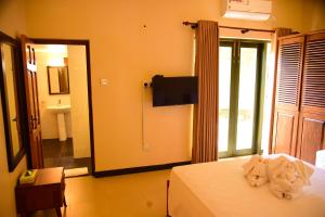 Μια τηλεόραση ή/και κέντρο ψυχαγωγίας στο Villa Olinia