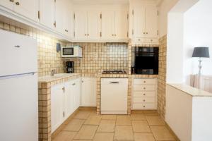 Kuchnia lub aneks kuchenny w obiekcie Location La Londe