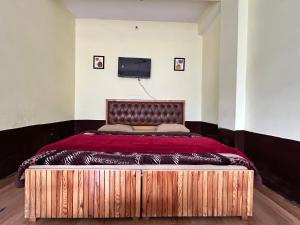 Postel nebo postele na pokoji v ubytování Malang Kasol