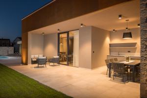 Patio nebo venkovní prostory v ubytování Design Villa Palmeta