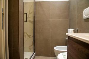 Koupelna v ubytování Rome Armony Suites