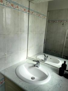 Kúpeľňa v ubytovaní Bel Appartement en front de mer -Palavas les Flots