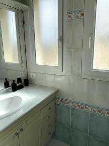 Kúpeľňa v ubytovaní Bel Appartement en front de mer -Palavas les Flots