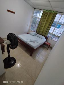 Postel nebo postele na pokoji v ubytování Hotel rubiales