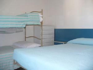 Postel nebo postele na pokoji v ubytování Albergo Villa-Brandi --- PENSIONE COMPLETA ---