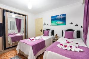 Ένα ή περισσότερα κρεβάτια σε δωμάτιο στο Nefesim suit apart kaş kalkan