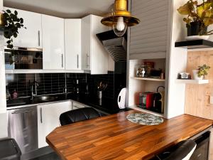 Dapur atau dapur kecil di Une terrasse sur la mer