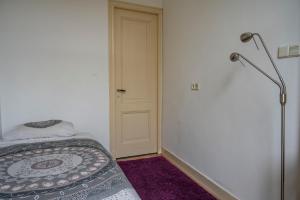 Postel nebo postele na pokoji v ubytování J&J