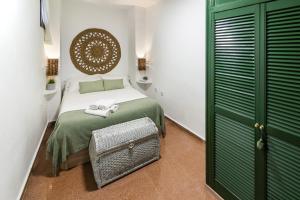 Posteľ alebo postele v izbe v ubytovaní Lightbooking Cordoba Plaza Corredera