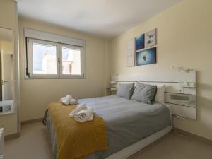 Posteľ alebo postele v izbe v ubytovaní Nuevos Lightbooking Livian Suites Las Palmas
