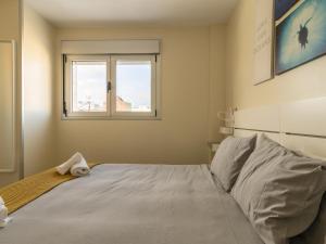 Posteľ alebo postele v izbe v ubytovaní Nuevos Lightbooking Livian Suites Las Palmas