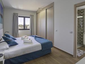 Postel nebo postele na pokoji v ubytování Lightbooking Villa El Molino piscina privada climatizada