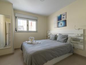 Posteľ alebo postele v izbe v ubytovaní Nuevos Lightbooking Livian Suites Las Palmas