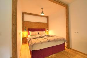 Postel nebo postele na pokoji v ubytování Alpen Apartment Werfenweng - Ruhe - Pool