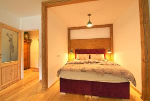 Postel nebo postele na pokoji v ubytování Alpen Apartment Werfenweng - Ruhe - Pool