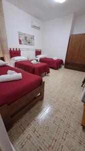 Postel nebo postele na pokoji v ubytování Hotel Soleo