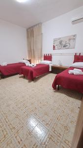 Postel nebo postele na pokoji v ubytování Hotel Soleo