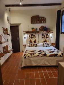 a bedroom with a bed with cow pillows on it at The Rabbit Hole in Rome