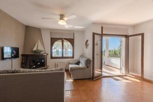 A television and/or entertainment centre at Casa Ancora by MarCalma