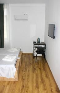 Postel nebo postele na pokoji v ubytování Hotel mia Telavi