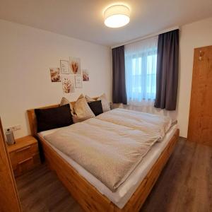 Posteľ alebo postele v izbe v ubytovaní Landhaus Stadlmann