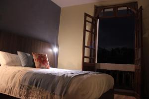 Letto o letti in una camera di Hotel Inti Quito