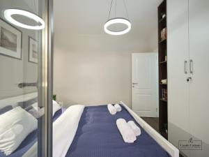 Postel nebo postele na pokoji v ubytování Condo Cattaro