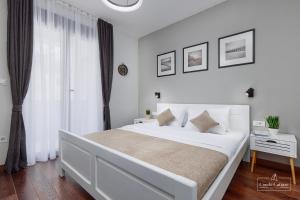 Postel nebo postele na pokoji v ubytování Condo Cattaro