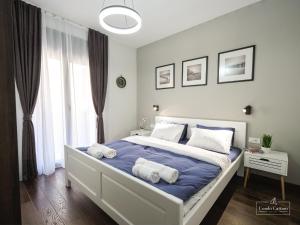 Postel nebo postele na pokoji v ubytování Condo Cattaro