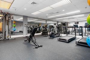 a gym with several treadmills and exercise bikes at Nantucket Inn in Nantucket