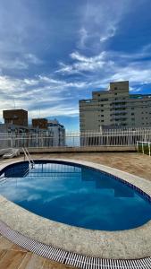 Apart Hotel Guarujáの敷地内または近くにあるプール