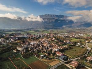 an aerial view of a city with a mountain in the background at CASANTO' in San Demetrio neʼ Vestini