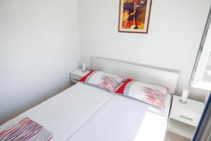Postel nebo postele na pokoji v ubytování Apartments 1234