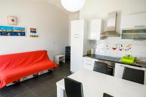 Kuchyň nebo kuchyňský kout v ubytování Apartments 1234