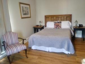 Postel nebo postele na pokoji v ubytování AUBERGE Knowlton