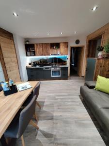 A kitchen or kitchenette at DaHome Appartements