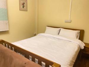 Postel nebo postele na pokoji v ubytování Dream House Lodge